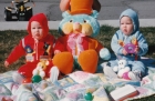 Easter 1986. Phillip and Loren 10 months old, enjoying a spring day in the front yard.