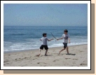 A little sword fighting on the beach - just call them the Pirates of the Caribbean!