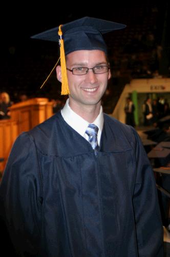Officially graduated.  Thank you, Grandpa, for running down there and taking some photos!