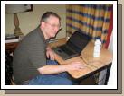 Alan working away all day in our bedroom while we played -- the life of the bread winner....