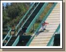 We spent several fascinated minutes watching fully dressed skiers take off down the jump....