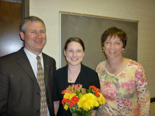 By the way, the award is the necklace she is wearing which has a Salt Lake Temple embossed on it.