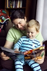 ...or with Mom. Kenyon just simply loves to read and be read to.