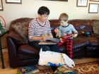 Opening the gift from the heart with Kenyon. I recorded myself reading some stories for him to listen to as he reads the books. Not sure he thought it was as fun as I did. :)