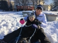 I may be too old to dress up, but I'm not too old to sled down the hill with Kenyon!