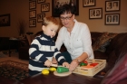 He cut up the wooden fruit, bread and vegies for literally hours! He did however get tired of putting back together and always wanted us to do it. :)