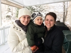 We borrowed snow pants and boots from a couple of neighbors so that the girls could take him sledding in the backyard.