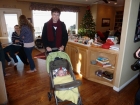 Kenyon all ready for his first ride in his new stroller. Of course Grandma wants to take him...maybe her neighbors will look out the window and think, \'How cute!\'