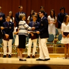 Head of School, Nancy Heuston awarding Clark his diploma. After 34 years, she is retiring with this Senior Class.