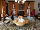 This was my favorite room in the house. I loved the yellow leather settee! Check out the ivory tusks and the portrait of Princess Ka'iulani over the fireplace.