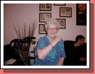 Then we had Shirley open a gift from us.  We gave her a bracelet with a picture of each one of our kids in it.  She loved it -- she is always wishing she had kids or grandkids of her own to brag about -- so we let her borrow ours!
