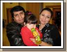 Andrea and Claudio (the father of our investigator, Gerardo) and their youngest, Isidora. They're from Chile. They have three other boys that were running around somewhere.