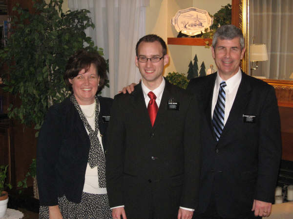 Phillip with President and Sister Farnsworth.