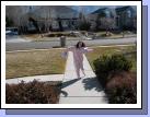 So Madeleine has a sleeper that she used for Halloween, but actually enjoyed sleeping in when it's really cold outside.  Even though she wasn't dressed, she decided to go out and get the mail -- silly girl!