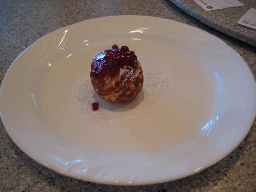 Hot with a spoonful of lingonberries and some powdered sugar --they were delish!