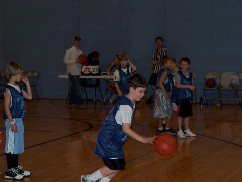 Clark is warming up for his last Jr. Jazz game of the season.