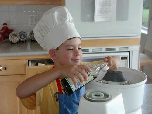 Clark making cookies with Mom...