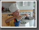 Clark making cookies with Mom...