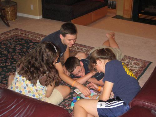 The kids having a great time playing Jennica's new game.