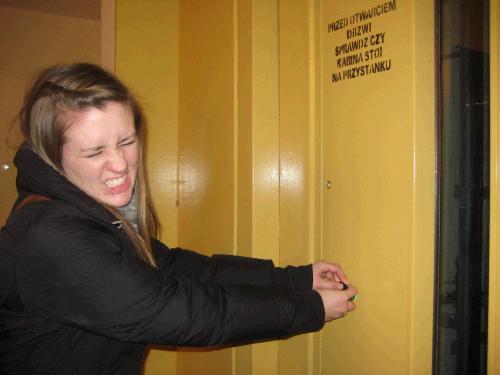 Sister Free disregarding the sign and trying to open the door before the elevator is there.  This is what we do to make tracting more bearable.