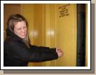 Sister Free disregarding the sign and trying to open the door before the elevator is there.  This is what we do to make tracting more bearable.