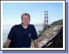Alan at the other end of the bridge.  When we first got there, the bridge was covered in fog.  But, as we stood there watching, it all rolled away.