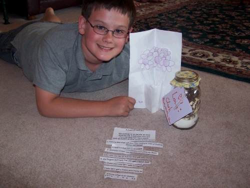 Clark did a really clever treasure hunt that took me all over the house looking for the treasure which turned out to be a jar of cookies mix he had made in school.  Very fun....  He also made me a really nice pop up card.