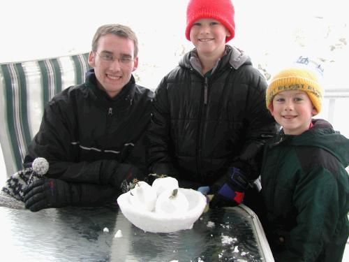 Brothers playing in the first snow of the year.  