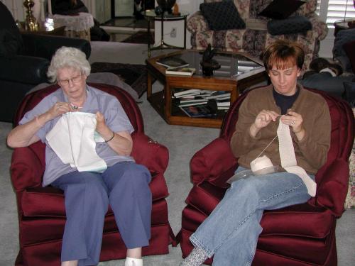 Aunt Shirley and I working away while everyone else plays -- ha, ha!