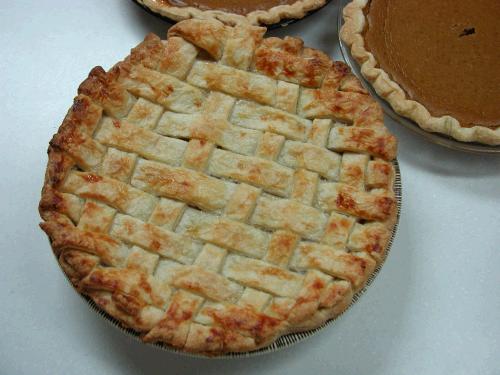I know what you are thinking....that we bought this pie - right?  Well, you're wrong.  Loren made this apple pie and the two pumpkin pies in the background.  I have to say it was the most gorgeous apple pie I've ever laid eyes on!