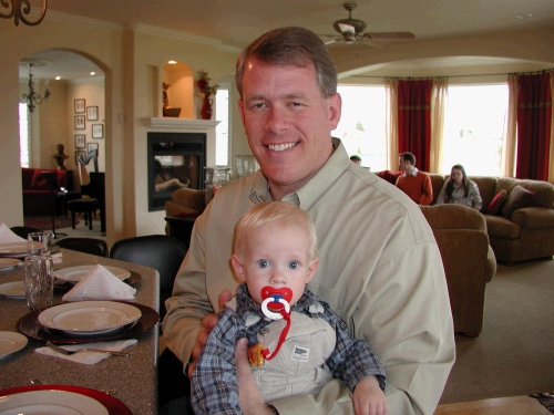 Brian (Megan's husband) holding their little Andrew.