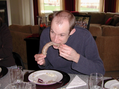 Jared thinks the turkey neck makes a nice second course.  
Alan is somewhere else partaking of the the gizzards!  Waste not, want not, I always say....argh.
