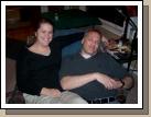Cherry and Mark trying to get comfortable on the same chair after a big dinner.
