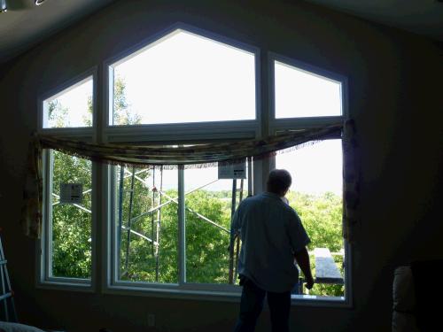 New windows for our bedroom.  At this moment the top three windows and the lower right window are empty.  Good thing we had nice weather that day!